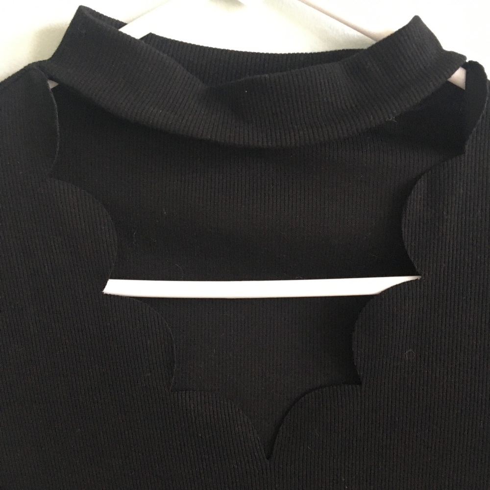 Black top with deep v and neck strap